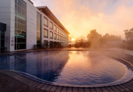 Luxury Weekday Stay for Two in a Deluxe King Room at Rydges Rotorua Incl. Buffet Breakfast at Chapman's Restaurant, Drink on Arrival, Late Check Out, Parking, & Access to Geothermally Heated Pool, Spa Pools and Gym - Option for Weekends & 2-Night Stays