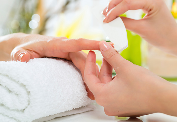 $35 for a 45-Minute Hand & Foot Pamper Package or $45 to incl. a Hot Stone Massage & Sugar Scrub (value up to $95)