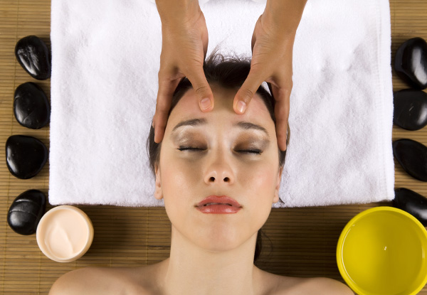 $65 for a 60-Minute Thai Hot Stone Facial Massage