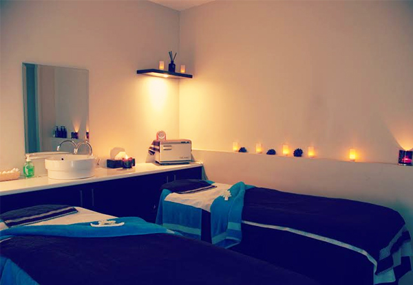 $79 for a 60-Minute Oasis Winter Ritual Treatment incl. Hot Stone Facial, Scalp Massage & Ear Candling (value up to $135)