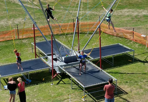 $8 for 12 Minutes of Bounce Time on the Bungy Trampoline, $4 for Six Minutes of Climbing Wall Time, or $10.50 for Both at Tahunanui Beach