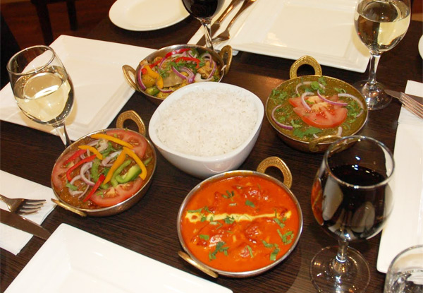 $29 for Two Curries & Rice with Naan & a Glass of Wine or Beer (value up to $64)