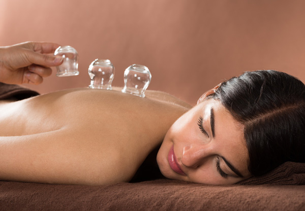 $20 for 30-Minute Cupping, $35 for a One-Hour Reiki or Hot Stone Massage, or $39 for a One-Hour Tuina Treatment (value up to $75)