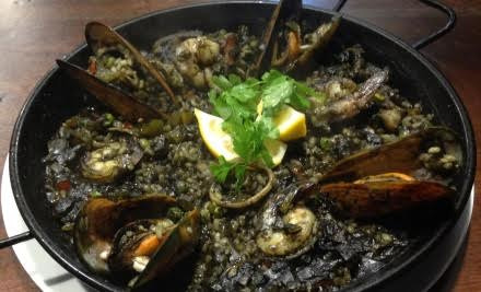 $26 for a Four-Person Seafood or Meat Paella (value up to $56) - CBD Location