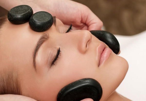 $79 for a 60-Minute Oasis Winter Ritual Treatment incl. Hot Stone Facial, Scalp Massage & Ear Candling (value up to $135)