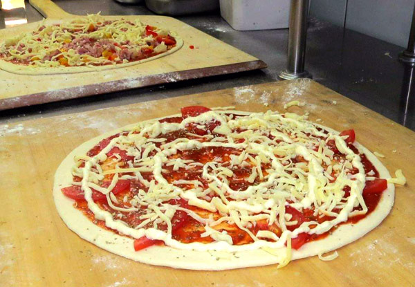 $25 for Two Takeaway 12-Inch Wood-Fired  Pizzas & Two Cans of Soft Drink (value up to $51)