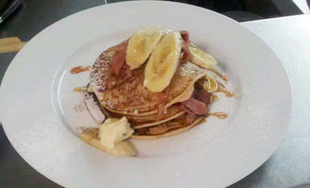 $20 for Two Café Breakfasts - Choose from Eggs Benedict, Pancakes, or Full House Breakfast