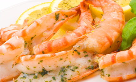 $35 for Four Tapas Plates & Two Glasses of Wine or Beer – Use Up to Four Coupons Per Table (value up to $77)