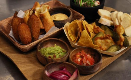 $49 for a Mexican Platter with Drinks - Bottle of Wine, Jug of Frozen Margarita or a Bucket of 4 Dos Equis Beers (value up to $99)