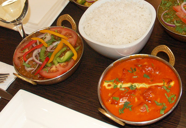 $29 for Two Curries & Rice with Naan & a Glass of Wine or Beer (value up to $64)