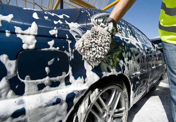 $40 for a Supreme Exterior Clean incl. Headlight Restoration or Hand Wax Polish – Four Options Available (value up to $310)