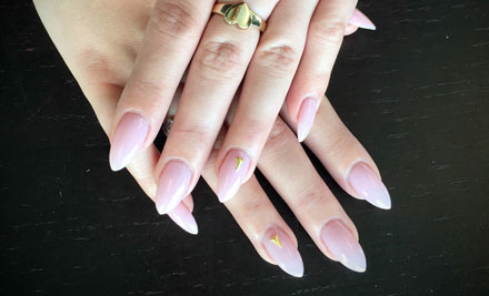 $25 for a Signature Gel Colour Polish Manicure or $35 for a Full Set of Acrylic Nail Enhancements (value up to $55)