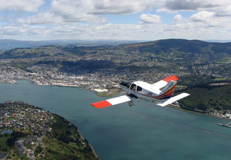 Grab a 20-Minute Hands-on Flight Over Dunedin for One Person for $119 from Mainland Air Services.