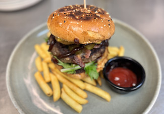 Two Gourmet Burgers Incl. Fries or Two Gourmet Pizzas for Two People at Jacz Sports Bar - Option for Four People