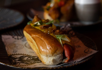 Two Gourmet Hotdogs & a Bottle of Dunes & Greene Sparkling NV for Two-People - Option for Four-People
