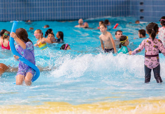 Family Pass Entry to Baywave Aquatic Centre incl. Four Hyrdoslide Passes, Two Popsicles & Two Regular Hot Drinks