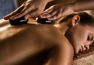45-Minute Winter Bliss Hot Stone Massage incl. Eyebrow Shape & Tint; Option For 60-Mins or to add a Facial