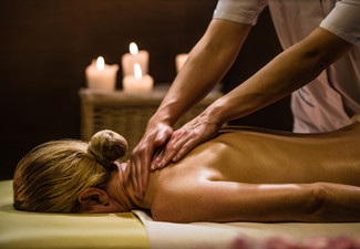 60-Minute Aromatherapy or Hot Stone Full Body Massage Using Soothing Thai Herbal Balm & Ginger-Honey Drink After Session for One-Person - Option for Couples & 90-Minute Massage