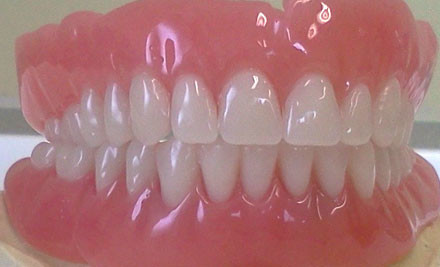 How do you clean dentures?