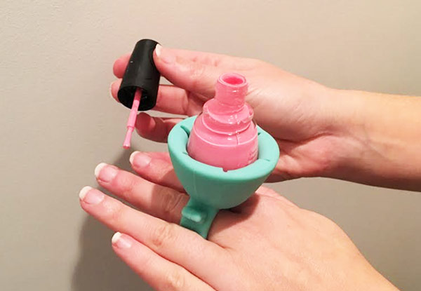 $9.99 for a Wearable Nail Polish Bottle Holder, $16 for  Two, or $20 for Three - Available in Pink or Green