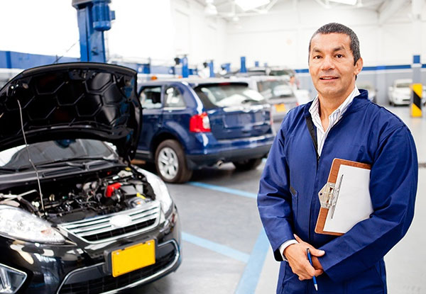 $55 for an Automotive Oil & Filter Change incl. Engine Flush - Two Locations (value up to $85)