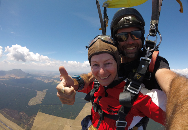 12000-Feet Tandem Skydive Package incl. $40 Voucher Towards a Camera Package or Exit Image - Option for 15000-Feet
