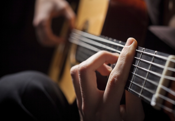 Guitar Lesson with a Professional Guitarist & Tutor - Option for Four Follow Up Lessons