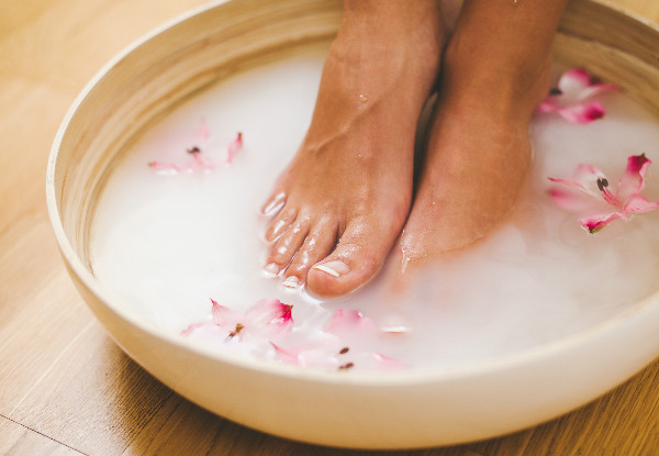 90-Minute Winter Warmth & Luxury Pampering Package incl. Hot Stone Massage for Back, Neck, & Shoulder, Delicious Foot Soak with Reflexology Massage & Warming Ear Candling
