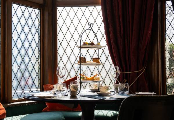 Luxe Getaway Package - Experience a One or Two Night Stay in a Queen Room at Eliza's Manor Boutique Hotel with A La Carte Breakfast, High Tea, Complimentary Mini Bar, & Late Checkout included