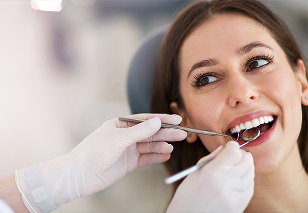 Ease Dental Pain Package incl. Consult, X-Rays & Your Choice of One Tooth Extraction, Filling, First Stage Root Canal Treatment or Periodontal Cleaning & Irrigation