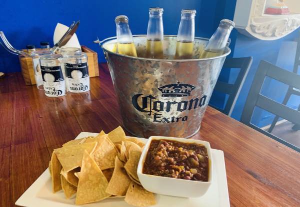 Bucket of Four Coronas, Chilli Con Carne Dip & Freshly Fried Corn Chips for Two People to Share