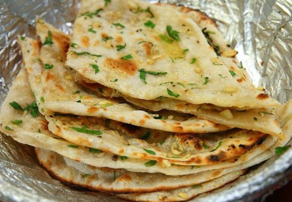 $32 for an Indian Dinner for Two People incl. Two Mains, Naans & Onion Baji to Share – Options for up to Six People Available (value up to $186)