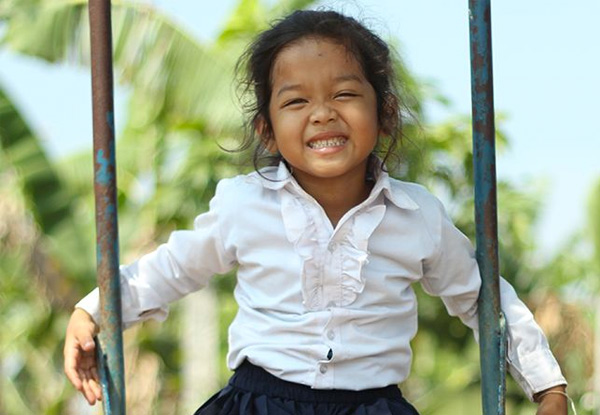 Gift Playground Equipment with World Vision Smiles