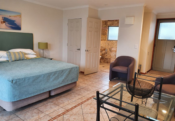 Indulgent Weekend Escape for Two in Whangamata incl. Private Hot Tub, Continental Breakfast & 11am Late Check-Out - Options for Two or Three Nights