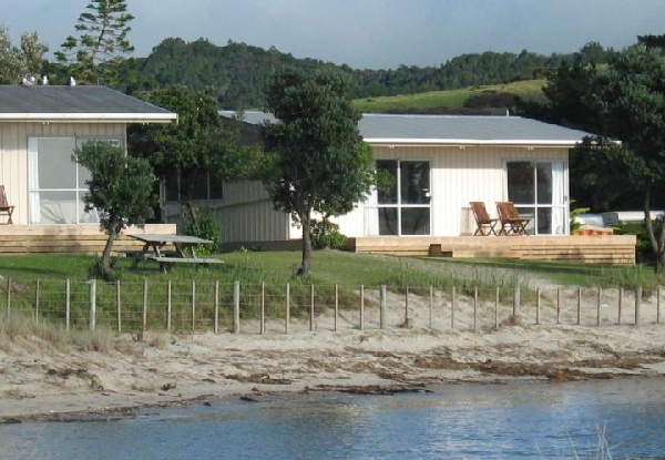 Weekday Two Night Family Getaway in a Two-Bedroom Beachfront Cottage incl. Free WiFi, Kayak & Paddle Board Hire