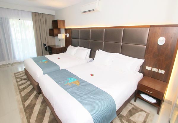 Per Person Twin Share, Five-Night Stay at The Palms Denarau in a Double Queen Guestroom or a One Bedroom Apartment incl. All Prepayable Taxes & Return Coach Transfers to/from Nadi Airport / Denarau - Option to Add Kids