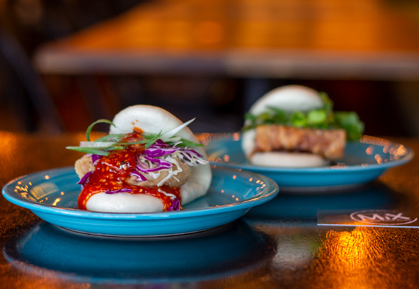 Asian Inspired Banquet for Two incl. Any Two Bao, Dumplings, A Small Sharing Plate & Two House Beverages