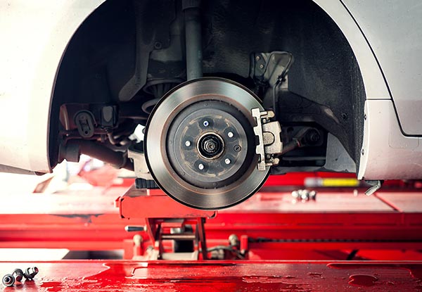 Front or Rear Brake Pad Replacement incl. a Full Brake Fluid Flush & Refill with Fresh DOT 4 Brake Fluid, Valid for Four Cylinder Cars Only - Options for Both Front & Rear Brake Pad Replacement