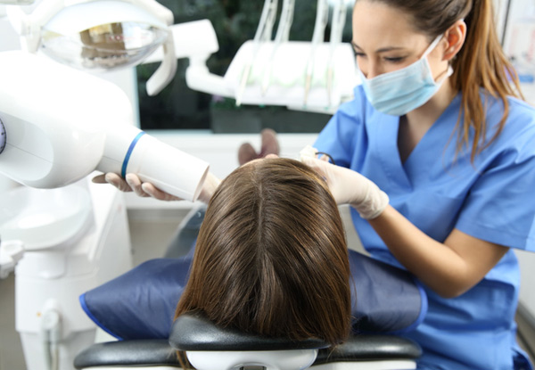 Hygienist Clean, Dentist Exam & Two X-Rays