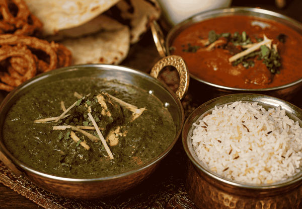 Curry Dinner for Two People incl. Curries, Rice, Naan & Onion Bhaji