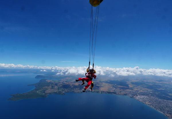 12000-Feet Tandem Skydive Package incl. $40 Voucher Towards a Camera Package or Exit Image - Option for 15000-Feet