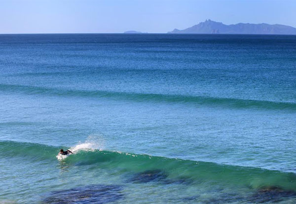 Two-Hour Group Surf Lesson incl. Board & Wetsuit Hire for One Person or Private Lessons – Options for Two People