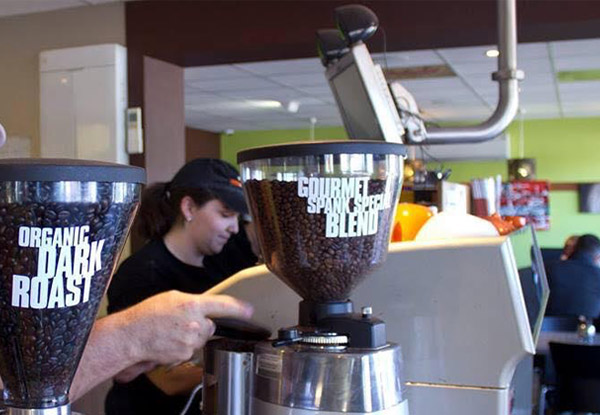 Two Medium Hot Beverages with Two Iced Cake Donuts at The Naked Baker