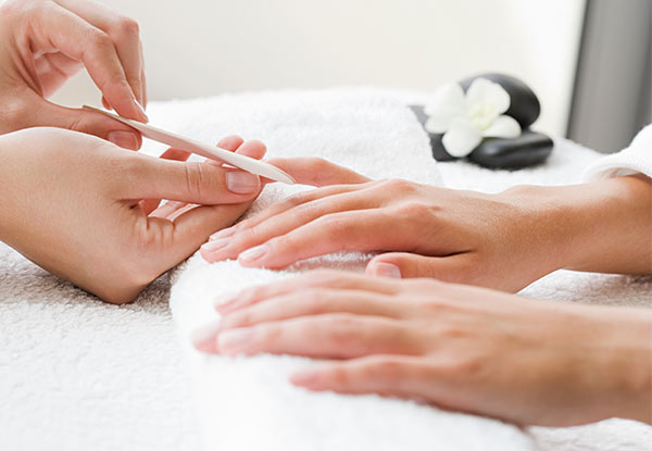 Gel Manicure or Pedicure - Options for a Deluxe or a Signature Soft Hands Manicure