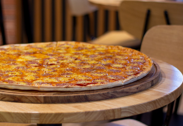 Experience the Largest Pizza in New Zealand with One 60cm Giant Proper Pizza - Feed Your Family & Friends with an Option for Two Pizzas