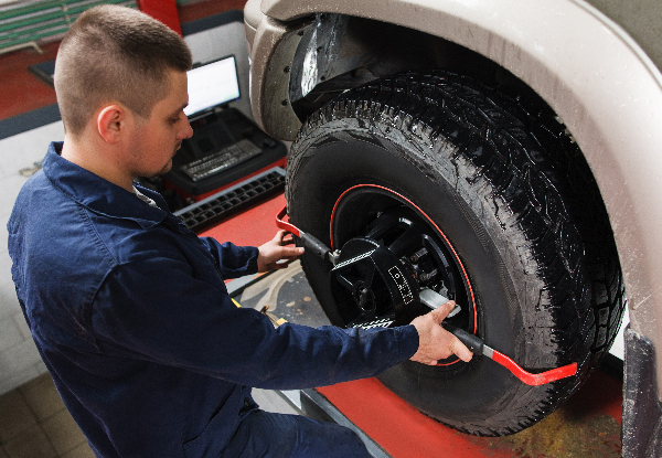 MTA-Approved Wheel Alignment & Shim Adjustment incl. 10-Point Safety Check & Complimentary Headlight Buff