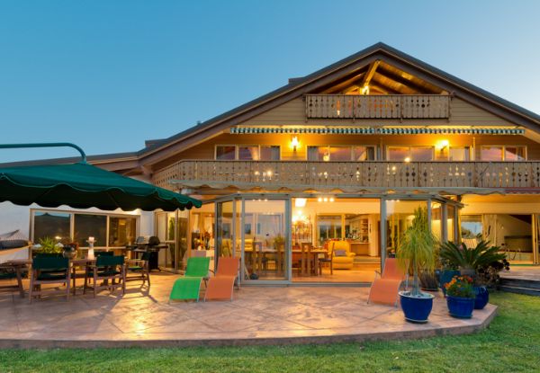 Per-Person, Twin-Share Two Night Fly/Stay Bay of Islands Getaway at Chalet Romantica incl. Breakfast, Spa Access and Glass of Bubbles - Option for Three Night Stay