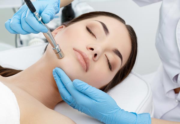 One Microdermabrasion Facial Treatment or One Dermaplaning Facial - Option for Both Facials
