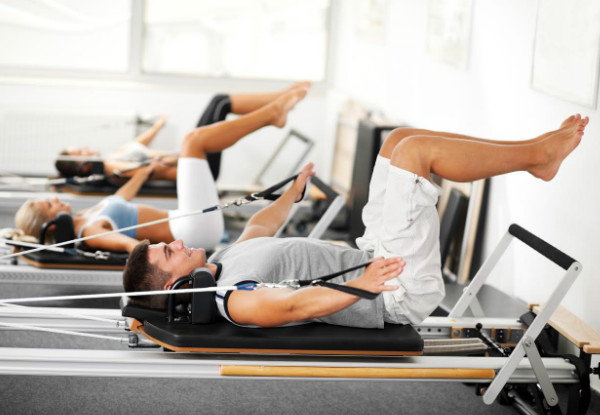One-on-One 40-Minute Pilates Intro Session & Nine Pilates Classes - Options for Mat or Reformer Classes