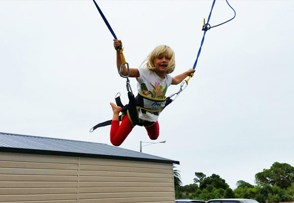 $8 for 12 Minutes of Bounce Time on the Bungy Trampoline, $4 for Six Minutes of Climbing Wall Time, or $10.50 for Both at Tahunanui Beach